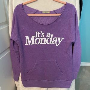 “It’s a Monday” off the shoulder purple sweatshirt